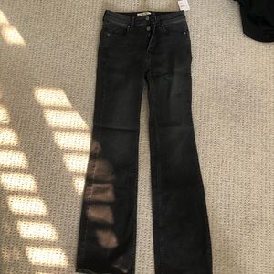 New with tags black bootcut jean. We the Free